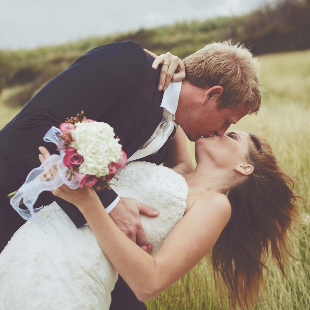 Thriving in Your Second Marriage: 7 Rules 1 second marriage happy couple in grass fields